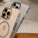Two clear iPhone cases with glitter accents.