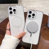 Two clear MagSafe-compatible iPhone cases, one with a charger attached.