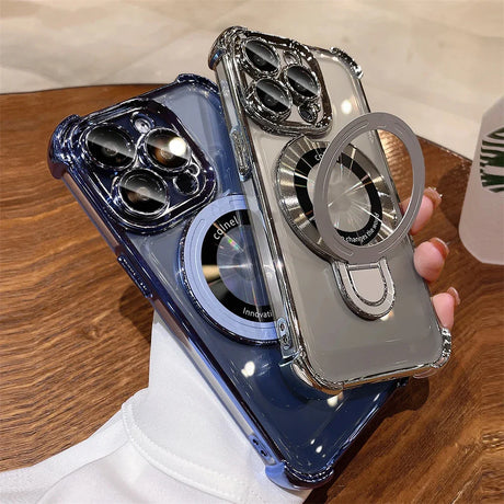 Two clear phone cases with metallic accents and ring stands.