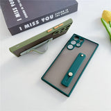 Two different colored frosted silicone phone cases with integrated stands.