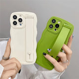 Two colorful phone cases with wrist straps.
