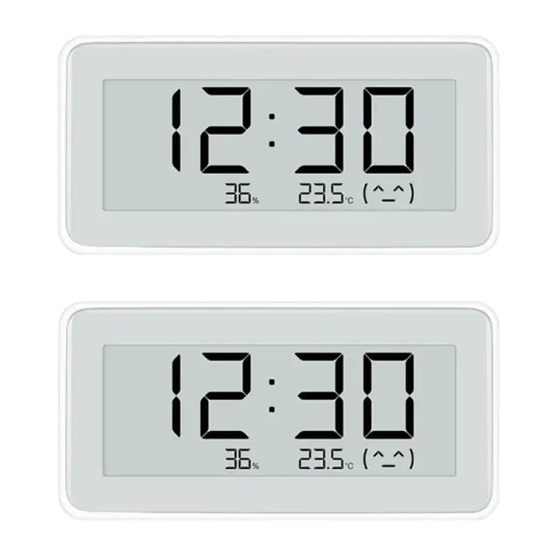 Two digital clocks with thermometers on them