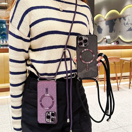 Two glittery phone cases with crossbody straps.