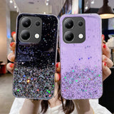 Two glittery smartphone cases, one black and one purple, with sparkly designs.