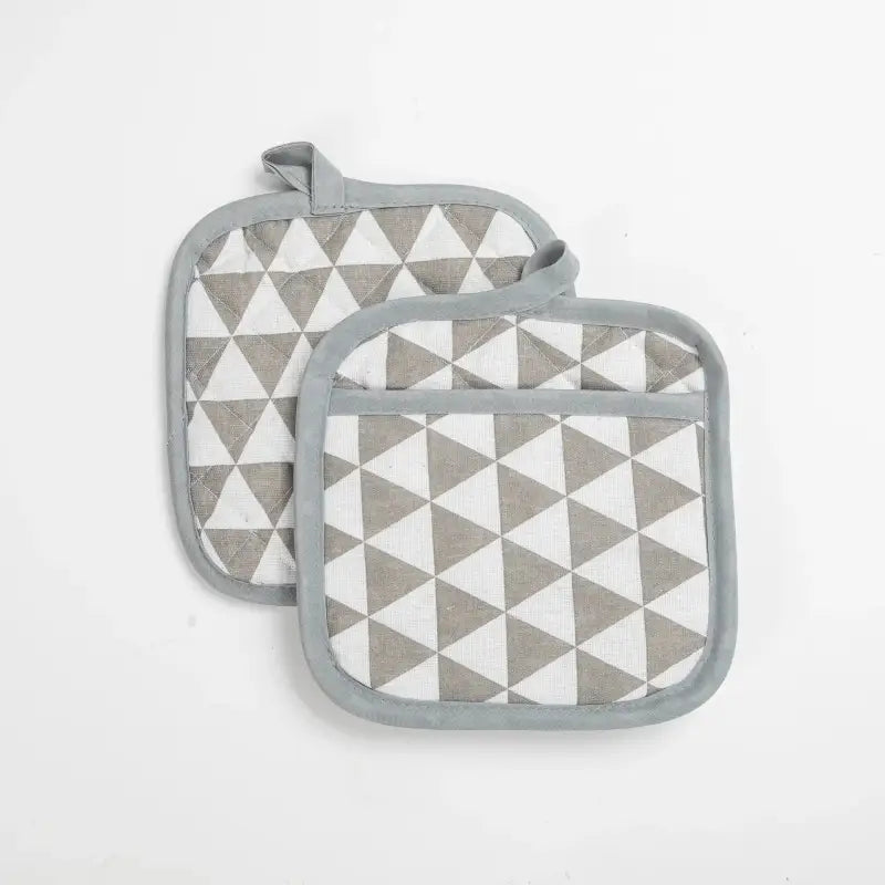 two grey and white triangles pot holders