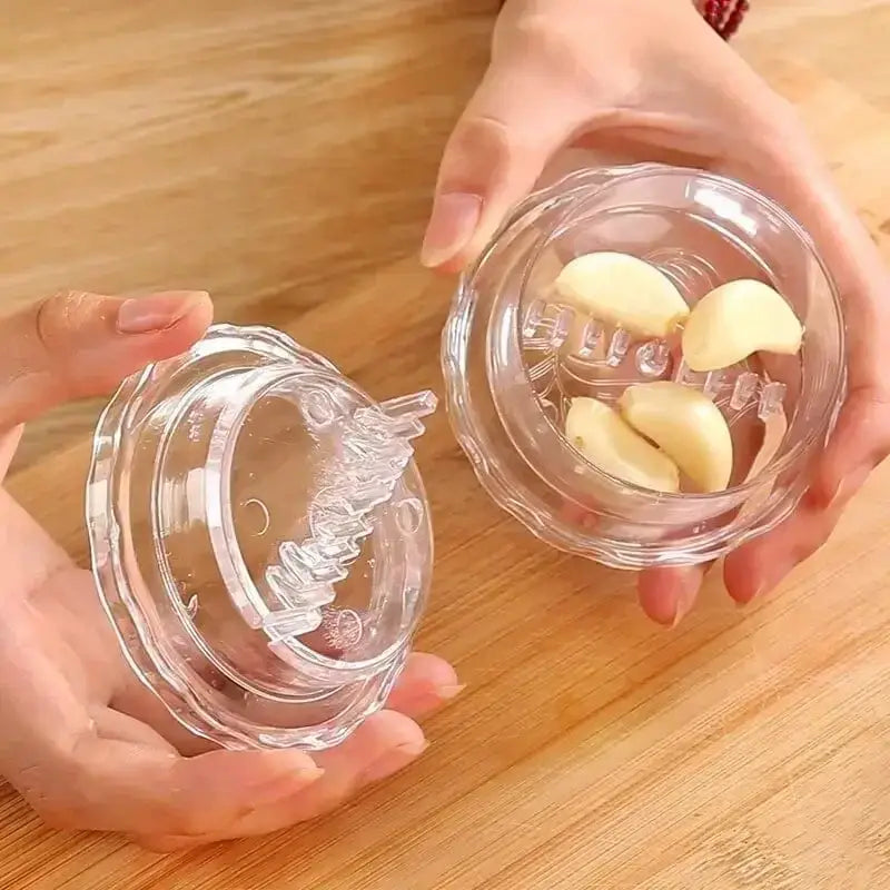 two hands holding two glass jars with a small piece of butter