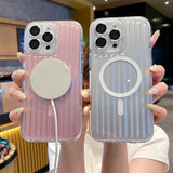 Two hands holding up pink and silver ribbed phone cases with MagSafe charging.