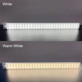 two images of a white light that is on a table