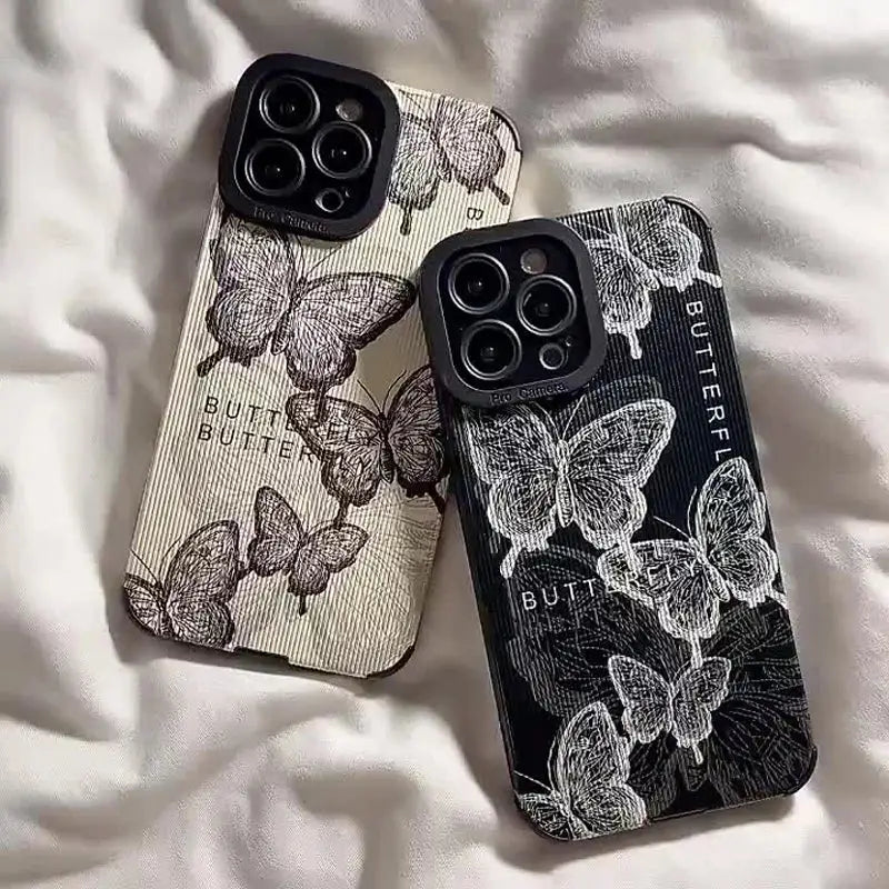 two iphone cases with butterflies on them