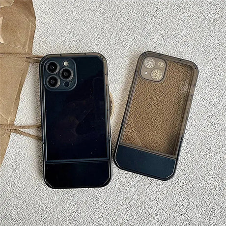 Two iphone cases sitting next to each other one