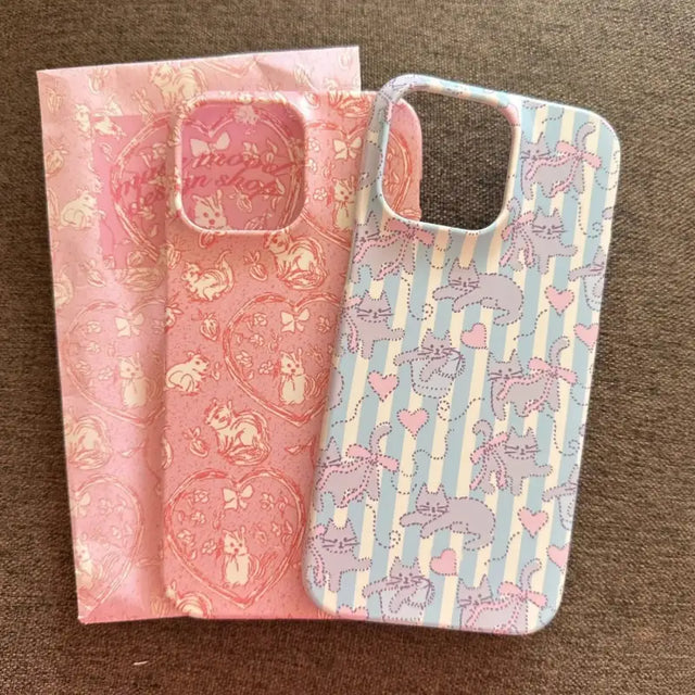 two iphone cases with a pink and blue pattern