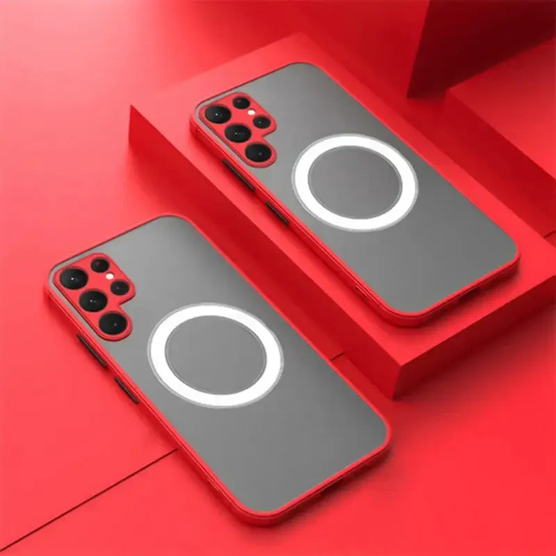 two iphone cases with a red background