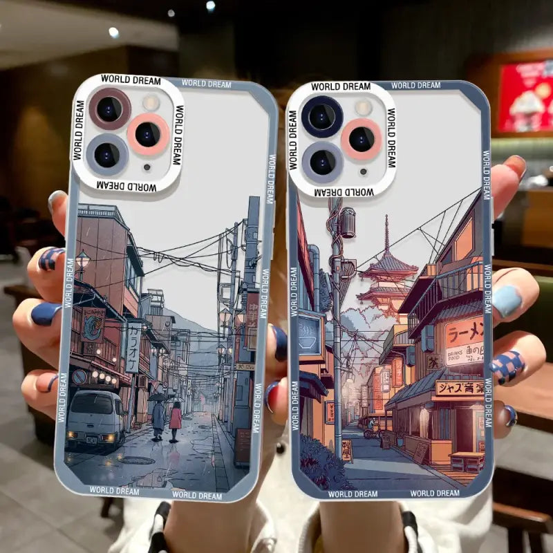two iphone cases with a street scene on them