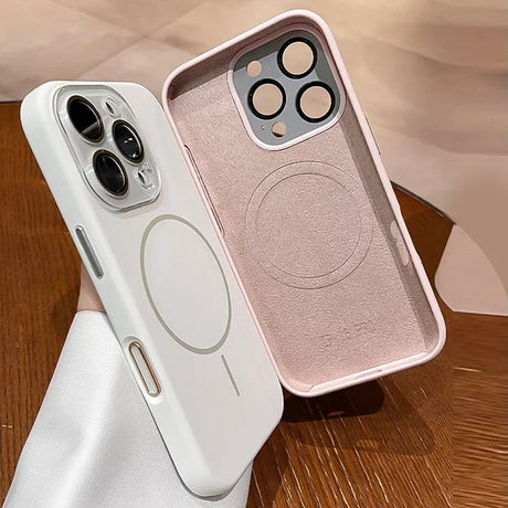 Two iPhone cases, one white and one pink.
