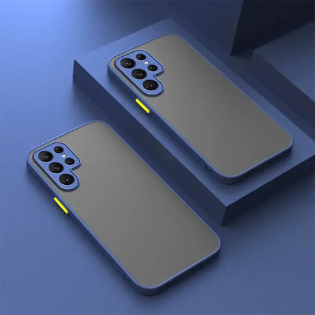 two iphone cases with yellow light on them