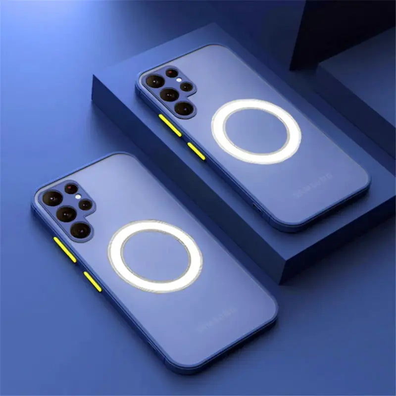 two iphones with a circular light on them