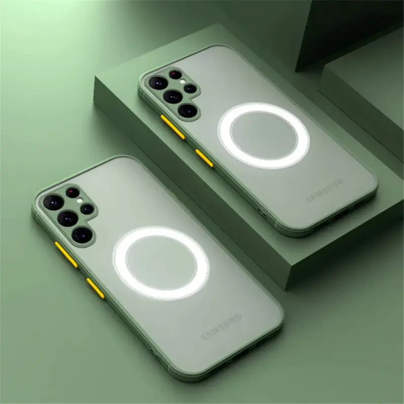 two iphones with a light on them