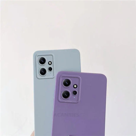 Two iphones with purple and blue cases