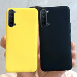 two iphones in yellow and black