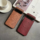 Two leather phone cases, one tan and one maroon, with an embossed circular design and a rectangular black camera cutout.