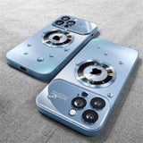 Two light blue iPhone cases with camera lens protection and a prominent magnetic ring for MagSafe.