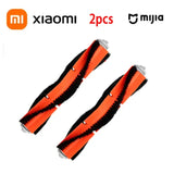 two orange and black armbands with black trims on them