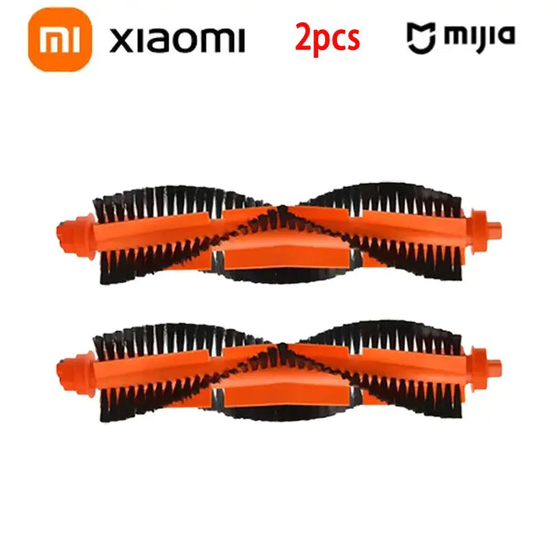 two orange and black hair brushes with black handles