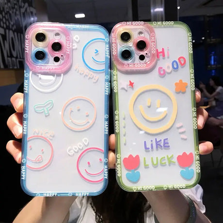 two people holding up their cell cases