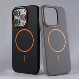 Two phone cases with orange accents.