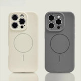 Two silicone phone cases with MagSafe, one in off-white and one in dark grey.