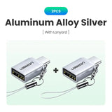 two silver colored cables connected to a silver colored cable