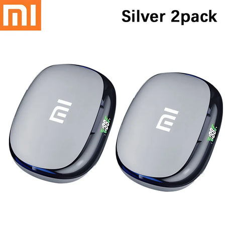 Two silver Xiaomi wireless earbuds or earbud cases with the Mi logo.