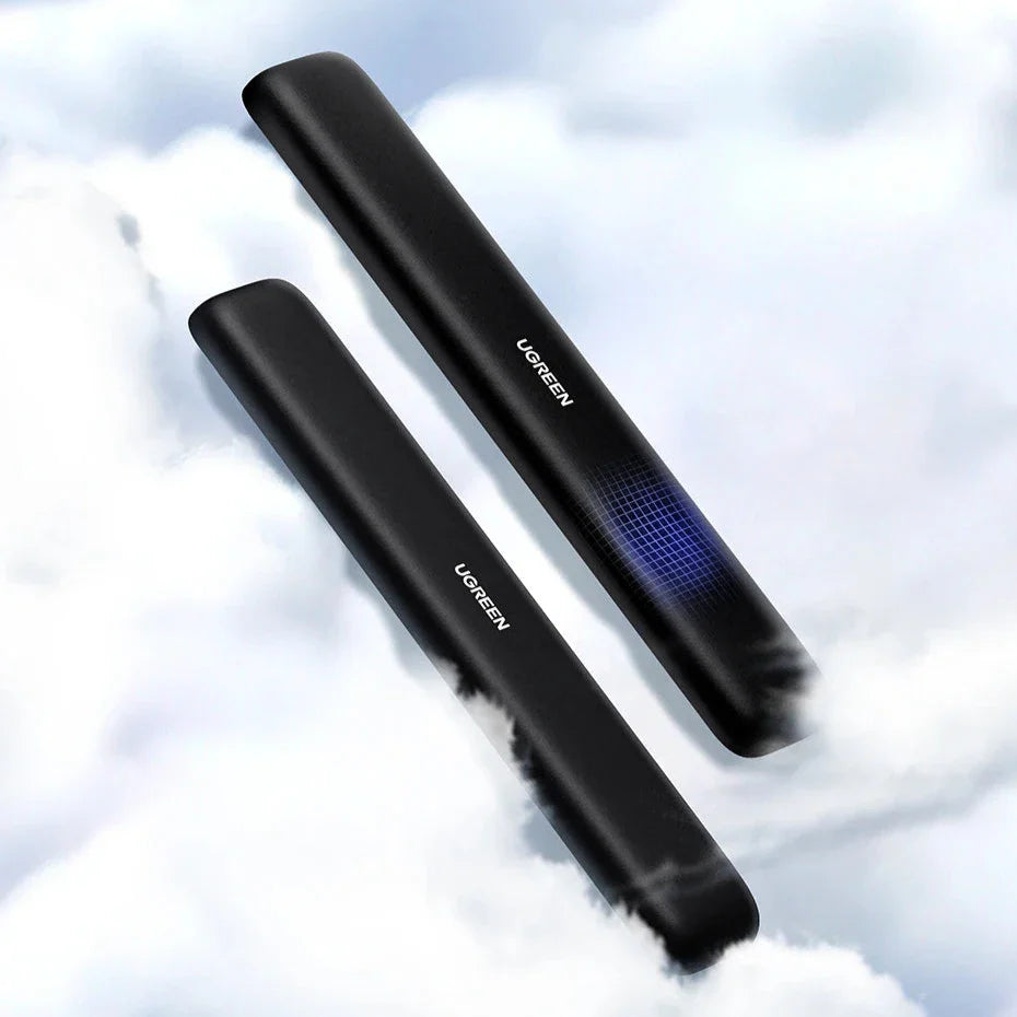 Two sleek black electronic devices, likely vaporizers or e-cigarettes, with a blue LED display on one.