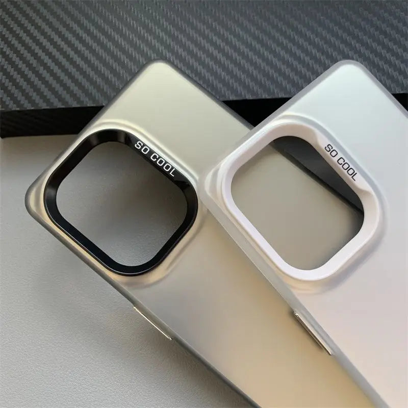 Two smartphone camera lens protectors or cases, one in silver and one in white.