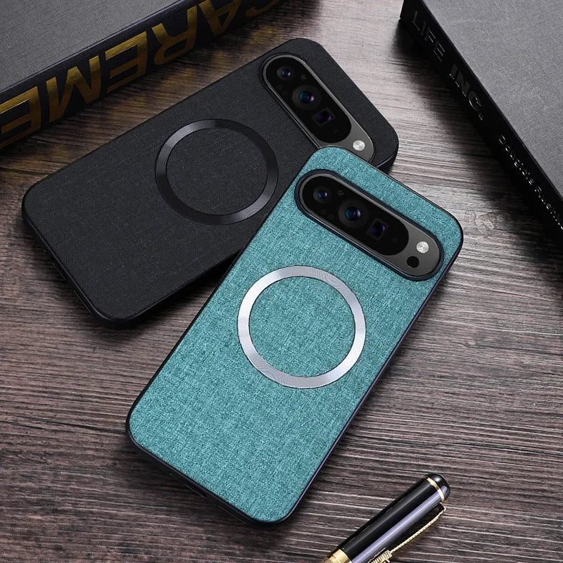 Two smartphone cases, one black and one teal, with circular magnetic attachments visible.