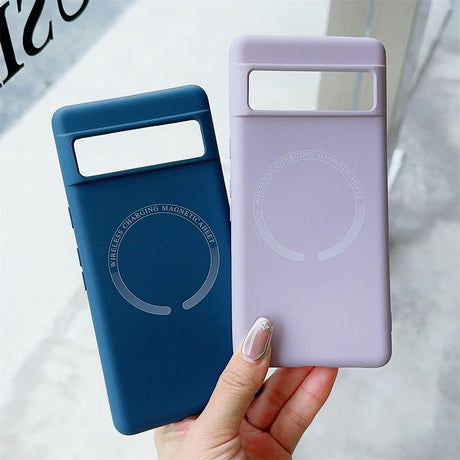 Two smartphone cases, one blue and one light purple, with circular designs and rectangular windows.