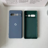 Two smartphone cases, one blue with a Google logo and one dark green.