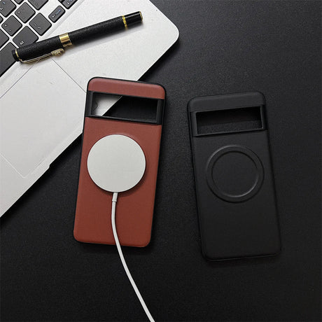 Two smartphone cases, one brown with a circular cutout and attached charging cable, and one black with a similar circular design.