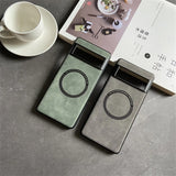 Two smartphone cases with circular designs, one in green and one in gray.