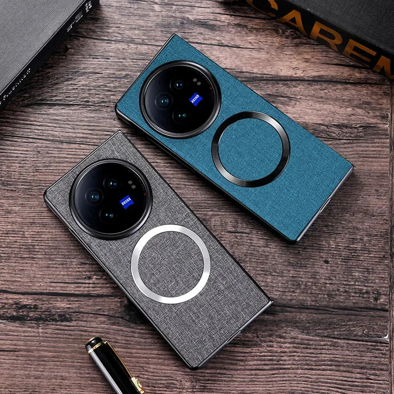 Two smartphone cases with circular camera cutouts and ring-shaped features.