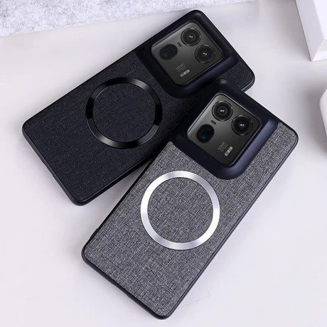 Two smartphone cases with a fabric texture and magnetic rings.