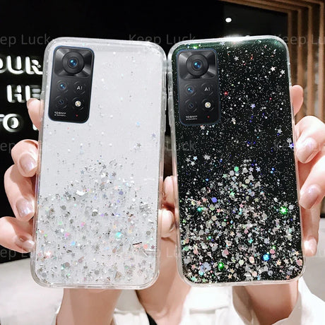 Two smartphone cases with glittery, sparkly designs.