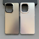 Two smartphone cases side by side, one gold-toned and one silver-toned, with square camera cutouts.