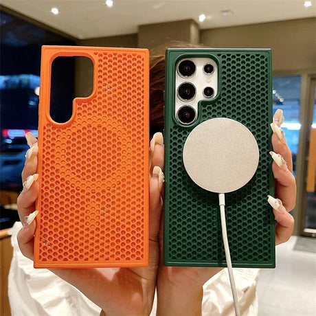 Two smartphone cases, one orange and one green, with textured honeycomb patterns.