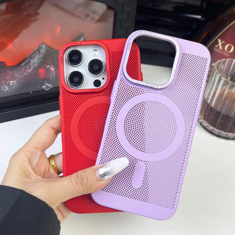 Two smartphone cases, one red and one purple, with circular perforated designs.