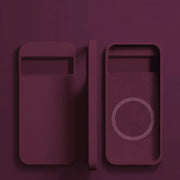 Two smartphone-shaped objects with minimalist designs in a burgundy color.