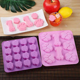 there are two trays of pink and purple shaped like letters