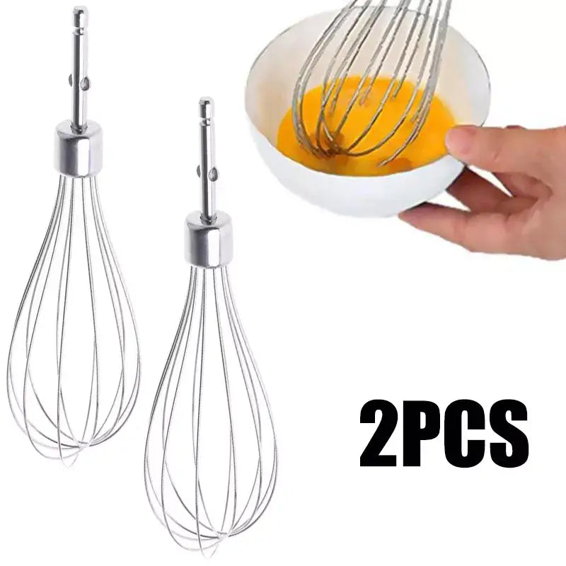 two whisks in a bowl with a hand holding a whisk