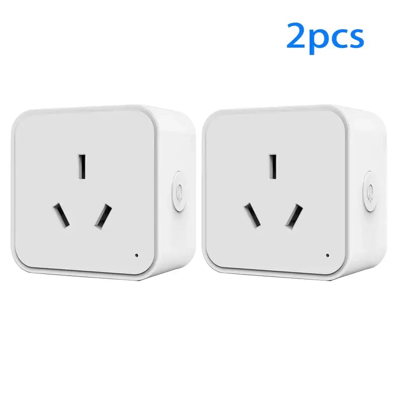 two white plugs with a black one on each side