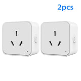 Two white plugs with a black one on each side